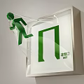 Green Emergency Exit Hanging Sign With Running Figure Icon And EXIT Text On Wall