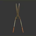 Vintage Brass Scissors With Long Metal Blades And Wooden Handles On Dark Background