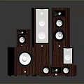 Wooden Computer Speakers With Various Sizes And Circular Drivers On Dark Surface