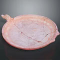 Pink Terracotta Sculpted Plate with Cracked Surface Dual Animal Head Handles and Geometric Diamond Patterns
