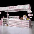 Pink And White Striped Candy Booth With Cartoon Dolls And Display Shelves