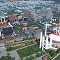 Aerial View of Modern Industrial Plant Featuring Large Domed Storage Tanks and Green Spaces