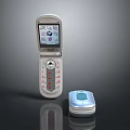 Large Silver And Small Blue Flip Phones With Screen Icons And Keypad