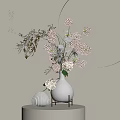 White Vase with Pink and White Hydrangea Flowers Green Leaves and Small Decorative Vase