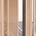Wooden Window Shutters Open And Closed In Light Wood Indoor Scene With Potted Plant