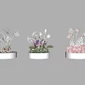 Elegant Floral Display Decorations On White Pedestals With White Pink Flowers And Decorative Greenery Elements