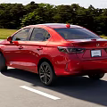 Red Honda Modern Sedan With Sleek Exterior Design And Black Alloy Wheels On Highway