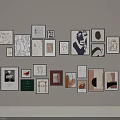 Stylish Photo Wall With Various Frames And Different Artworks On Neutral Wall