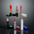 Various Colored Lipsticks With Different Casing Designs Arranged On Shiny Surface