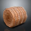 Coiled Natural Fiber Decorative Object With Spiral Pattern And Textured Surface