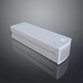 White Rectangular Object With Smooth Surface On Gray Background And Circular Button