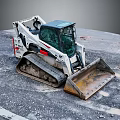 White Tracked Skid Steer Loader Parked On Gravel Construction Site With Front Metal Bucket