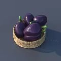 Fresh Purple Eggplants in a Wicker Basket on Gray Surface