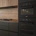 Modern Restaurant Kitchen Featuring Black Cabinets Wooden Backsplash Countertop Sink And Gas Stove