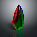 Colorful Polyhedron Crystal With Multiple Red Green Yellow Facets On Dark Background