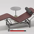 Burgundy Lounge Chair With Metal Frame And Round Concrete Side Table