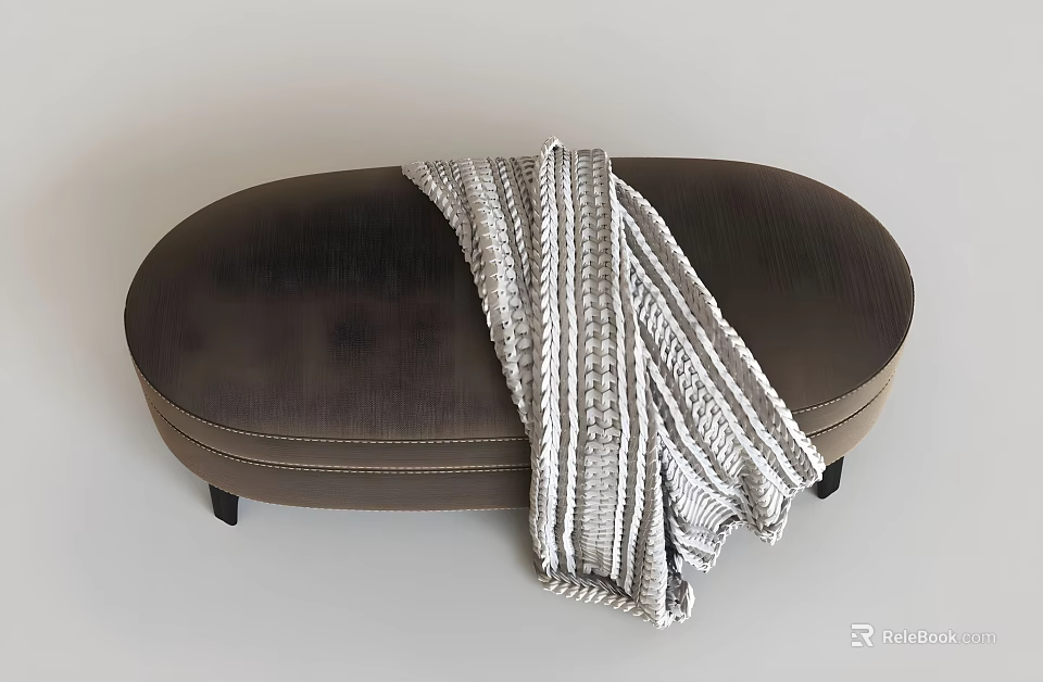 Dark Brown Oval Upholstered Ottoman With Light Gray White Striped Knitted Blanket 3d model 
