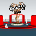 Garden Ornament With White Spherical Decor And Red Curved Seats In Outdoor Area