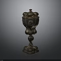 Antique Carved Bronze Sculpture With Intricate Lid And Decorative Base