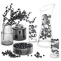 Glass Vases and Decorative Jars with Black Berries in Woven Basket and Pitcher