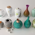 Elegant Colorful Perfume Cosmetics Bottles Featuring Various Unique Decorative Shapes