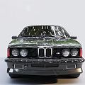 Vintage Green BMW Classic Car Front View With Sporty Design And Chrome Grille Details