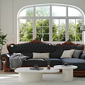 Black Carved Sofa With Wooden Accents And White Round Coffee Table Set With Green Plants