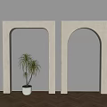 Two Beige Archways With Potted Plant Against Gray Wall And Herringbone Wooden Floor