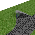 Public Outdoor Facility With Green Grass And Patterned Paved Pathway Design