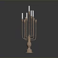 Brass Candelabra With Multiple Arms And White Candles On Black Surface