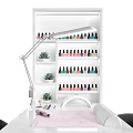 Professional Manicure Station With UV Lamp Nail Polish Tools And Succulent Plants On White Shelf