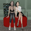 Two Women Sitting On Red Ottoman In Stylish Room