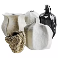 Modern Textured Ceramic Vessels With Diverse Shapes Matte And Glossy Finishes For Home Decor