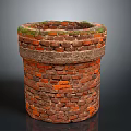 Red Brick Cylindrical Well Structure With Green Moss Top And Stone Edge