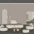 Modern Neutral Living Room Interior With Circular Sofa Round Coffee Table Pendant Light And Ottoman