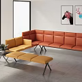 Orange Leather Double Sofa In Modern Interior With Yellow Accent Chair Ottoman And Wall Art