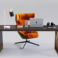 Modern Home Office Desk With Orange Chair Laptop Headphones And Table Lamp