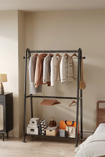 Black Metal Clothes Rack With Hanging Neutral Colored Clothes Leather Bag And Wooden Hangers 3d model