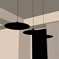 Three Modern Pendant Lights With Black Shades And Glass Bulbs In Kitchen Interior