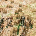 Cartoon Battlefield Scene With Soldiers Artillery And Grassland Terrain