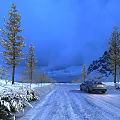 Gorgeous Winter Snow Landscape With Frosted Pine Trees And Car Driving On Icy Mountain Road
