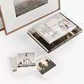 Modern Decorative Ornament Combination With Framed Artworks Aromatic Bottles And Stacked Books
