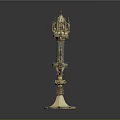 Elegant Golden Candle Lamp With Ornate Tower Design And Transparent Center