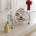 Modern Rolling Storage Rack with Toiletries Bottles Mirror and Towel on Bathroom Countertop