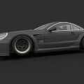 Gray Two Door Sports Car With Wide Body And Large Alloy Wheels