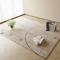 Light Colored Square Rug With Beige Stripes Circular Patterns White Flower Bouquet And Magazines On Wooden Floor
