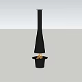 Modern Black Fireplace With Tall Chimney And Burning Flames In Minimalist Setting