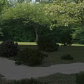 Garden Landscape Design With Green Lawn Curved Walkway Purple Flower Bushes And Trees