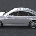 Silver Audi Sedan Featuring Sleek Design Alloy Wheels And Modern Front Grille