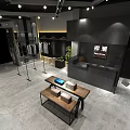 Modern Clothing Store Interior With Clothing Racks Display Area And Reception Desk